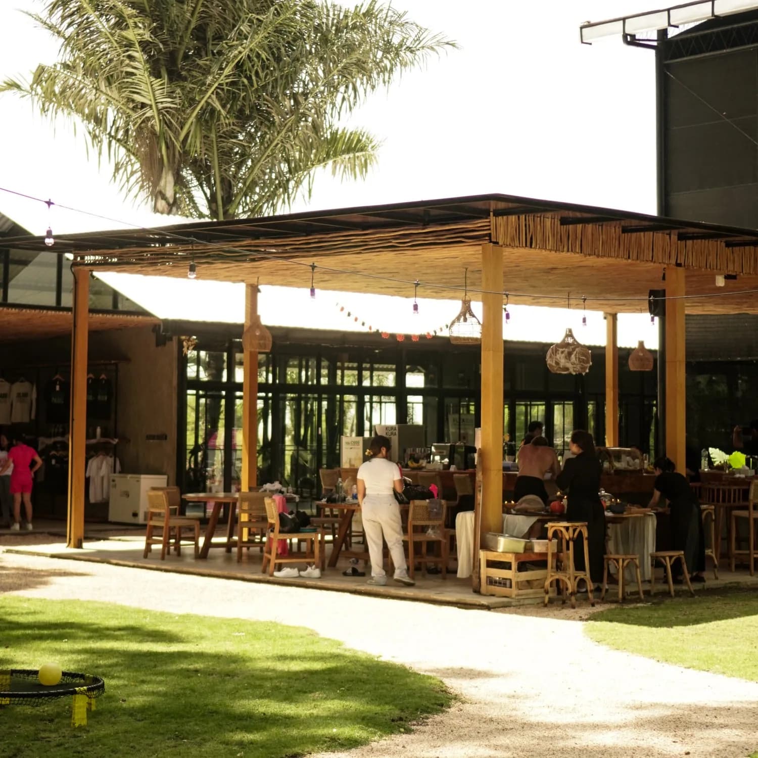 Open-air dining and garden at Island Sports Cemagi