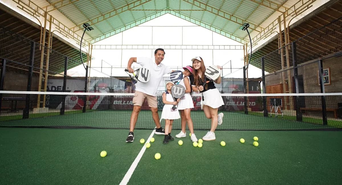 Players on the roofed court at Kamu Nakal Padel