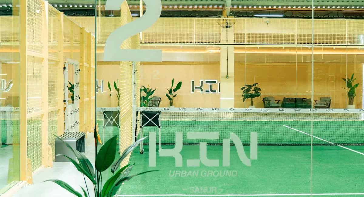 Indoor green padel courts at KIN Urban Ground - Sanur