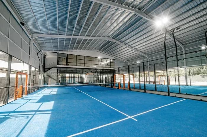 Blue indoor padel court at Liga.Tennis Sanur