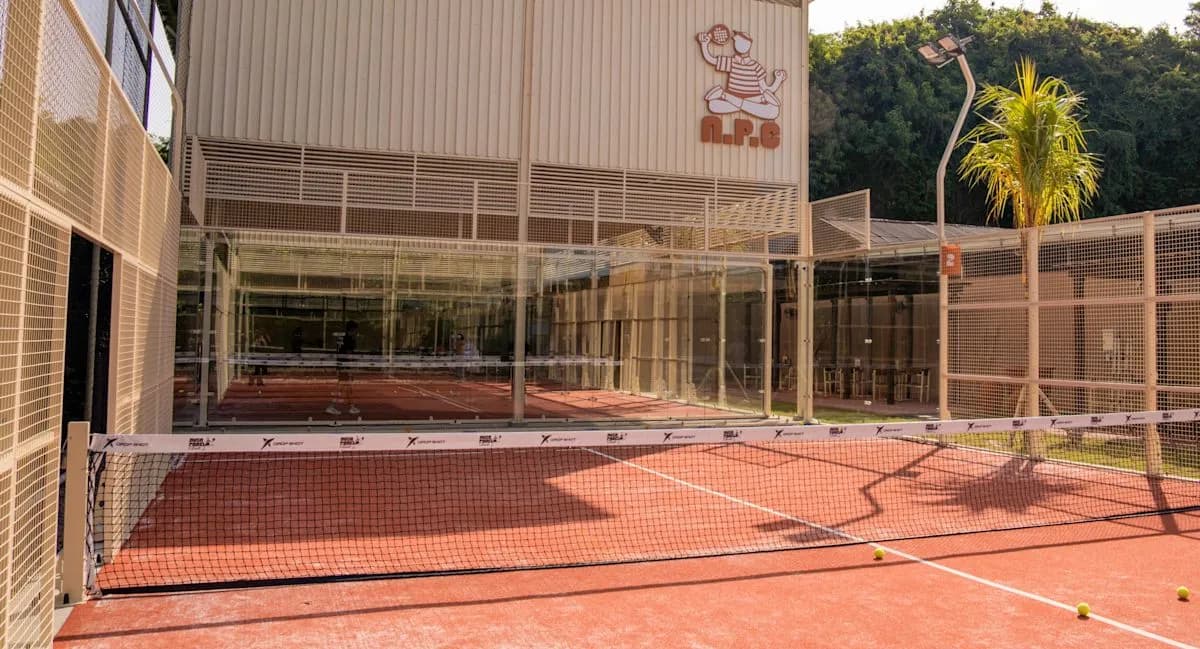 Outdoor pink padel court at Nusa Padel Club