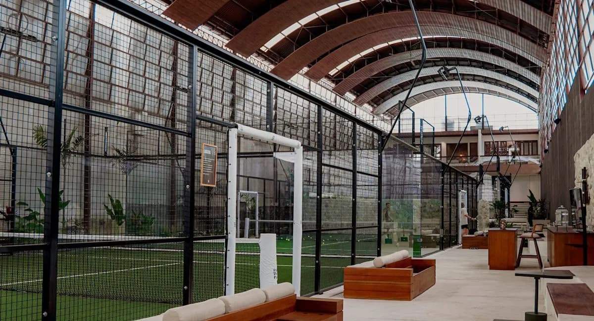 Indoor green padel courts at Pad Thai Padel Canggu