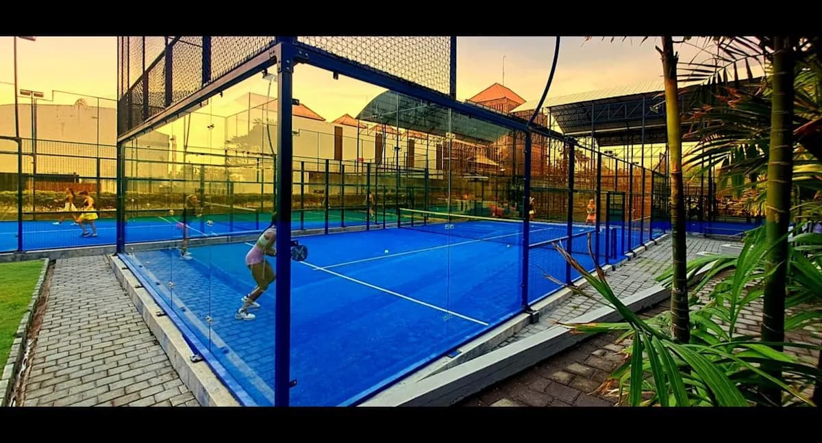 Blue courts at sunset at Paradise Padel Bali