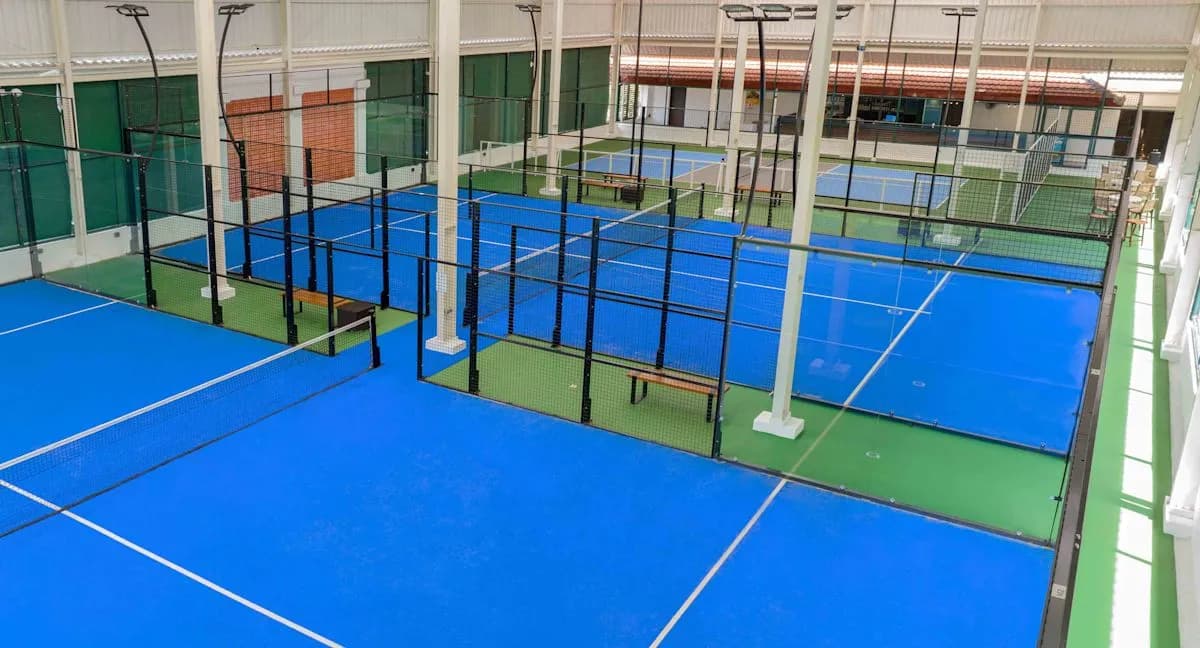 Blue roofed padel court at Prime Padel & Pickle