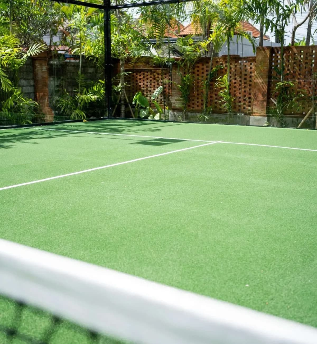 Outdoor green padel court at Sanur Padel Club