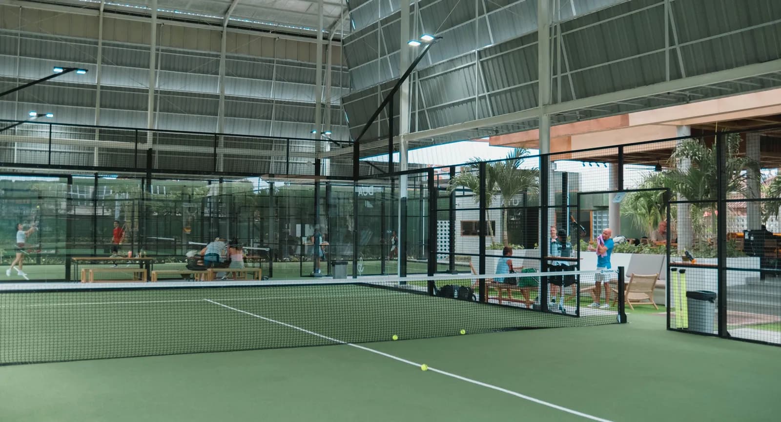Roofed green padel courts at Simply Padel Sanur