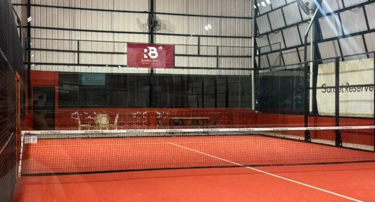 Indoor terracotta padel court at Sunset Reserve Padel