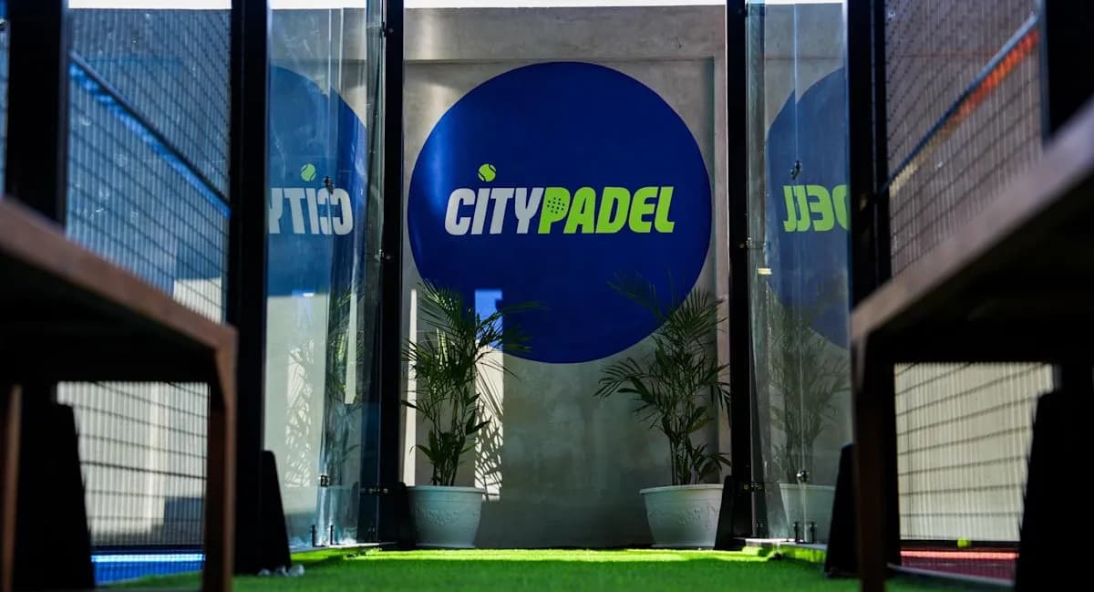 Padel court with club sign at City Padel Bali