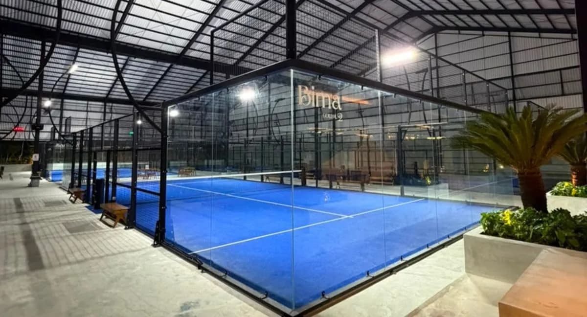 Blue indoor padel court at Dewata Padel Jimbaran