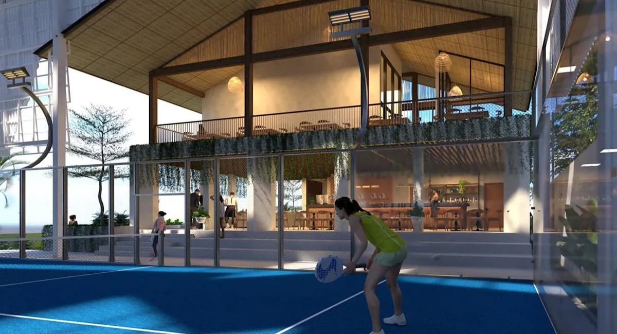 Players on a blue covered court at Le Cataya Padel Ground Bali