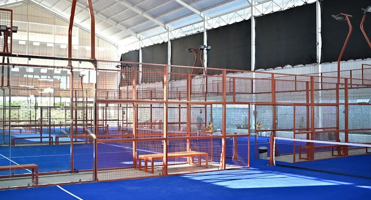 Blue indoor padel court at Padel Dise Bali